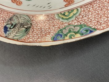 A Chinese famille verte dish with figures in a landscape, Kangxi